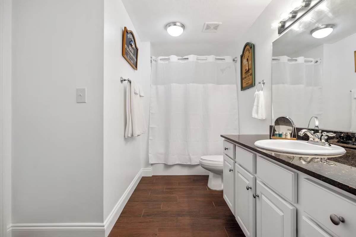 Hall Bathroom with entrances from the hallway and bedroom 2.  