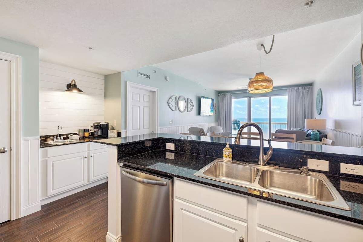 From the kitchen looking at the coffee bar and living room.